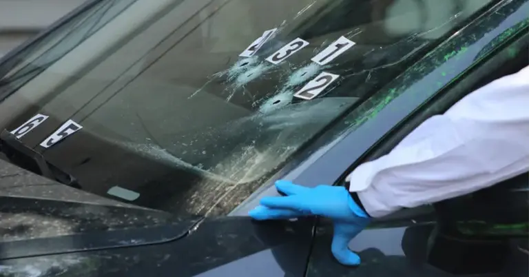 গাড়ির কাঁচ ভেদ করে প্রবেশ করে ঘাতকদের গুলি